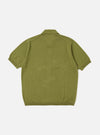 The Olive Cotton Lace Knit Jonny Knit Shirt is shown from the back as a flat lay against a plain white background. The shirt features a pointed collar, a straight hem, and a distinct open-mesh lace knit pattern throughout the olive green fabric.