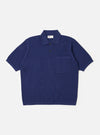 The Navy Fine Texture Tricot S/S Knit Polo is shown as a flat lay against a plain white background. The polo features a classic three-button placket, a structured collar, and short sleeves. The navy blue cotton fabric has a visible fine-textured tricot knit pattern throughout.