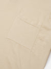 The Ecru Woolcot Bio S/S Pullover Knit Shirt II is shown from the back as a flat lay against a plain white background. The image highlights the simple, clean construction of the garment's rear, the short sleeves, and the soft, textured knit fabric in a solid ecru color.