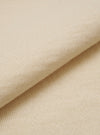 A close-up swatch image of the Ecru Woolcot Bio S/S Pullover Knit Shirt II highlights the fabric's soft, off-white color and smooth, lightweight knit texture. The image focuses on the fine blend of merino wool and organic cotton.