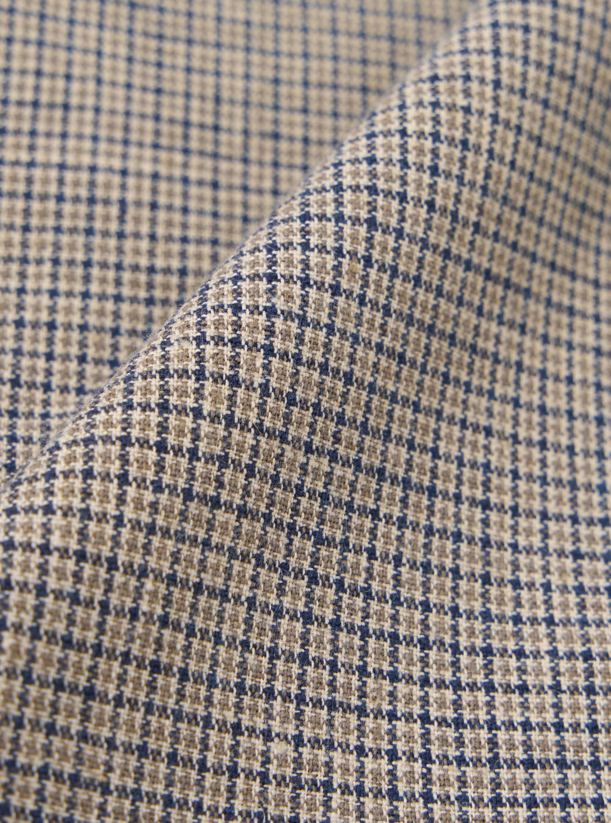 A close-up swatch image of the Multi Lucas Cotton Mix Military Chino fabric features a multi-colored check pattern. The textile detail highlights the weave and the varied colors within the check design.