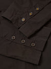 The Licorice Summer Canvas Manor Jacket is shown as a flat lay against a white background. The jacket is a casual, double-breasted blazer with four front buttons, a chest pocket, and two large patch pockets at the waist. The canvas fabric is a dark brown licorice color with a visible textured weave.
