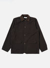 The Licorice Summer Canvas Labour Jacket is shown as a flat lay against a white background. The jacket features two chest patch pockets, two lower patch pockets with flaps, a five-button front closure, and a simple pointed collar. The cotton canvas fabric has a visible, textured finish.