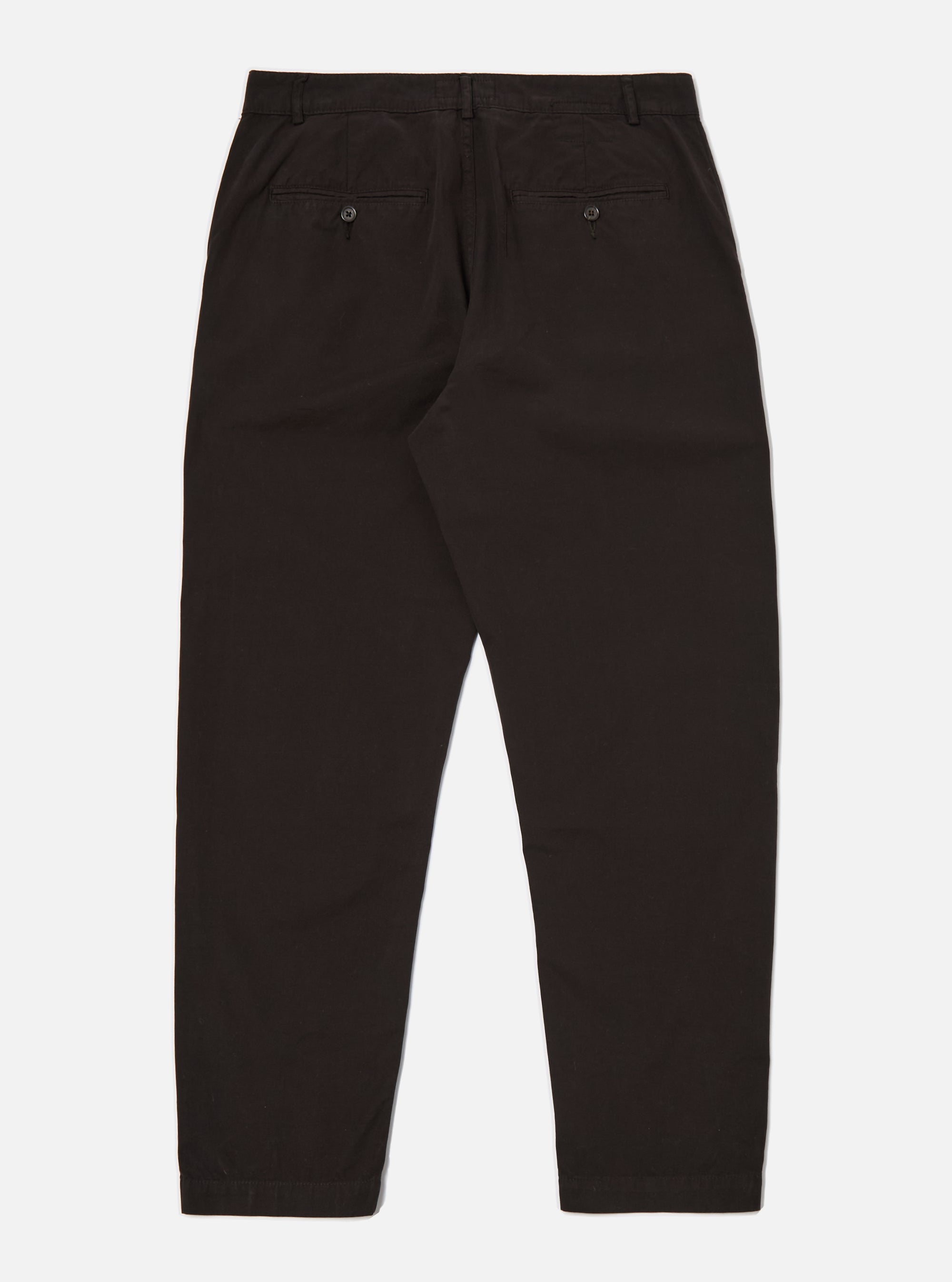 The Licorice Summer Canvas Military Chino is shown from the back as a flat lay against a plain white background. The image highlights the two rear jetted pockets with button closures and the straight-leg silhouette. The dark brown cotton canvas fabric features visible stitching along the seams and waistband.