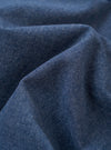 A close-up fabric swatch of the Blue Sintra Recycled Cotton Head Coach Jacket highlights the deep blue color and the textured weave of the recycled cotton material.