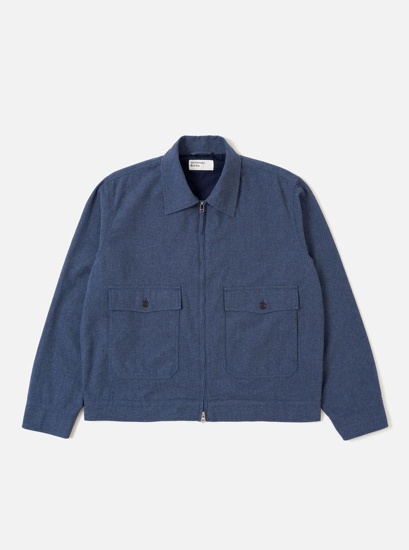 The Blue Sintra Recycled Cotton E130 Jacket is shown as a flat lay against a white background. The jacket features a two-way zip front, two front button flap pockets, and two additional handwarmer pockets. The design includes a structured collar and adjustable button cuffs. The blue recycled cotton fabric has a clean, solid appearance.
