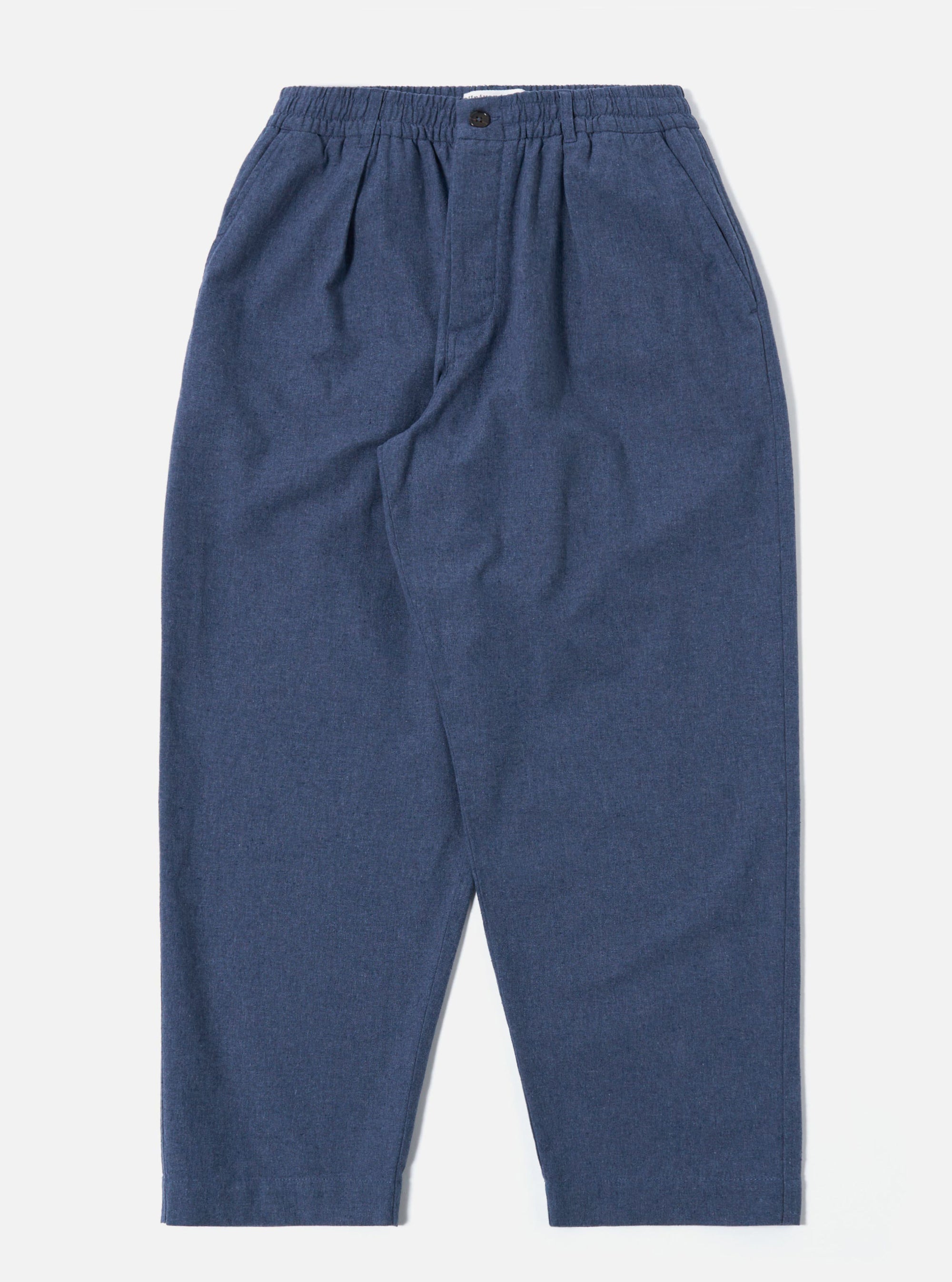 The Blue Sintra Recycled Cotton Oxford Pant is shown as a flat lay against a plain white background. The trousers feature a wide-leg silhouette, a pleated front, and an elasticated waistband with a matching blue drawstring. The fabric is a solid blue recycled cotton blend with a smooth finish.