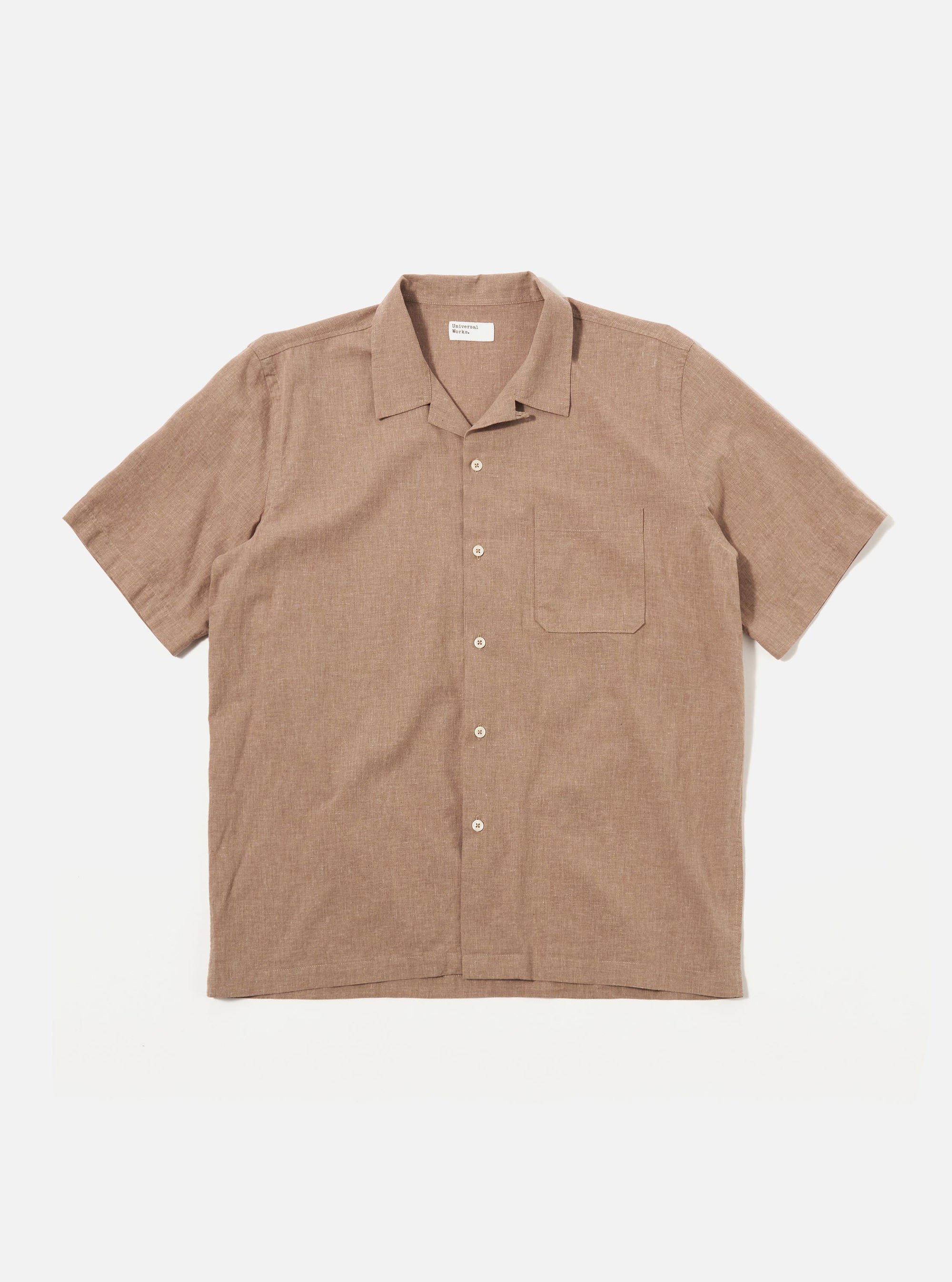 The Brown Sido Linen Mix Road Shirt is shown as a flat lay against a white background. The shirt features a one-piece loop-close collar, a full-length button-down front, and a single patch pocket on the left chest. The short-sleeved garment is made from a textured brown cotton-linen blend fabric and has a straight hem.