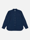 The Indigo Lincot Denim Lazy Day Shirt is shown as a flat lay against a white background. The shirt features a button-down collar, a central button closure, and a single asymmetrical chest pocket on the left side. The indigo blue fabric is a blend of cotton and linen with a visible denim texture.