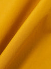 A close-up swatch image of the Golden Brown Organic Fine Poplin CPO Shirt fabric. The image focuses on the golden brown color and the smooth, tightly woven texture of the organic cotton poplin material.