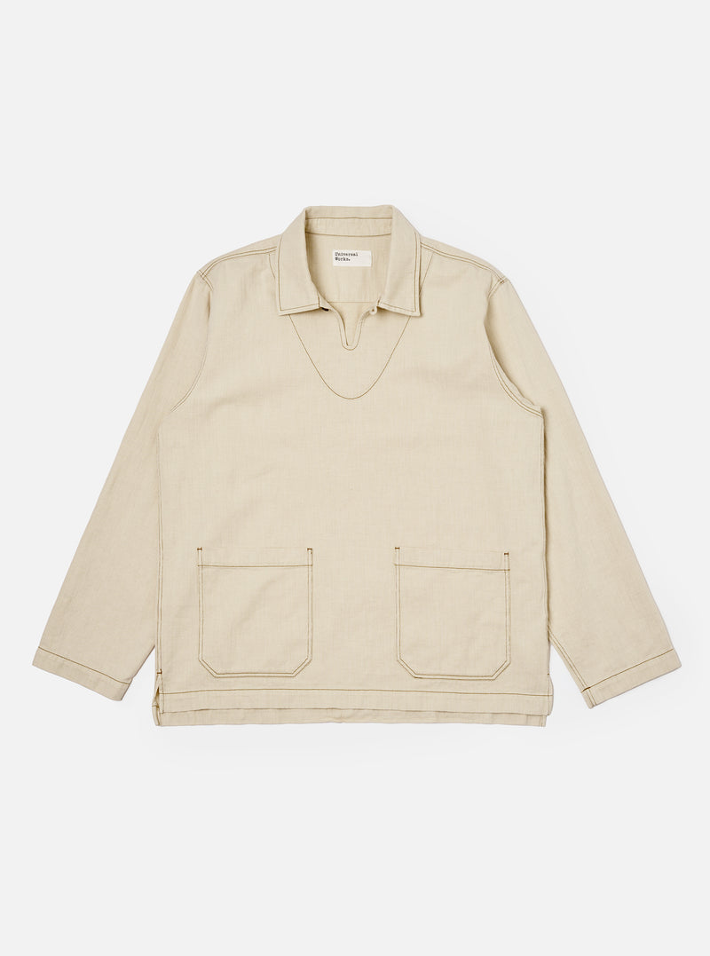 The Ecru Koko Cotlin Smock Overshirt is shown as a flat lay against a white background. The garment features a partial button-down front shown in an open position, a structured collar, and a chest patch pocket. The overshirt is made from a textured ecru cotton-linen fabric.