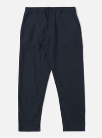 The Navy Valencia Cotton Military Chino is shown as a flat lay against a plain white background. The trousers feature a straight-leg cut, a button fly, and two large front patch pockets characteristic of military styling. The fabric is a dark navy textured cotton blend with visible stitching details.