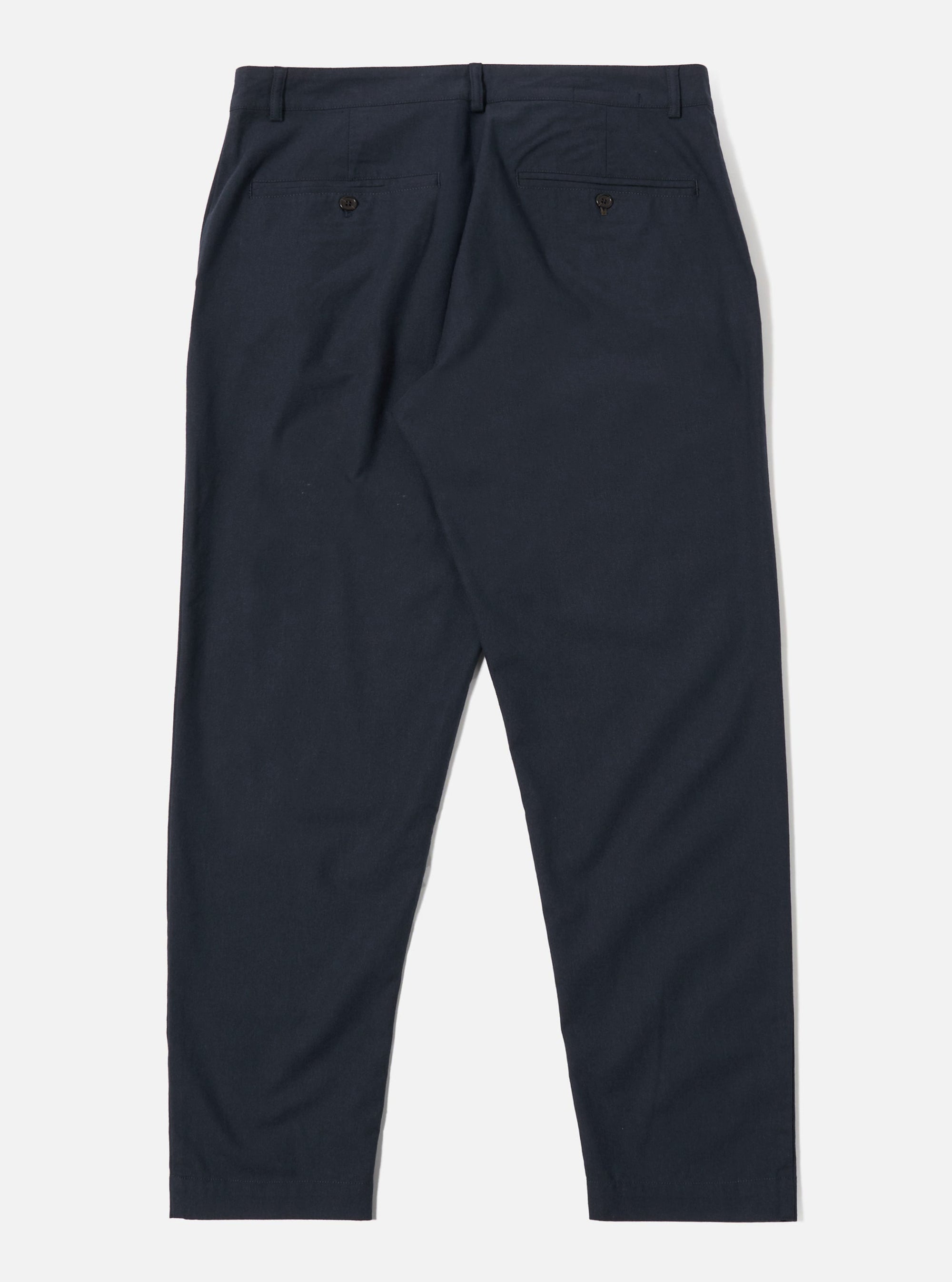 The Navy Valencia Cotton Military Chino is shown from the back as a flat lay against a plain white background. The image highlights the two rear pockets, the waistband with belt loops, and the straight-leg cut. The dark navy fabric has a subtle textured appearance.