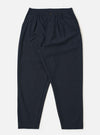 The Navy Valencia Cotton Pleated Track Pant is shown as a flat lay against a plain white background. The trousers feature an elasticated waistband with an external drawstring, a single pleat at the front, and two side pockets. The fabric is a dark navy blue with a smooth, clean finish.