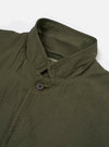 The Olive Merida Seersucker Three Button Jacket is shown as a flat lay against a white background. The jacket features three buttons, a classic lapel, one chest patch pocket, and two lower patch pockets. The olive green cotton fabric has a characteristic puckered seersucker texture.