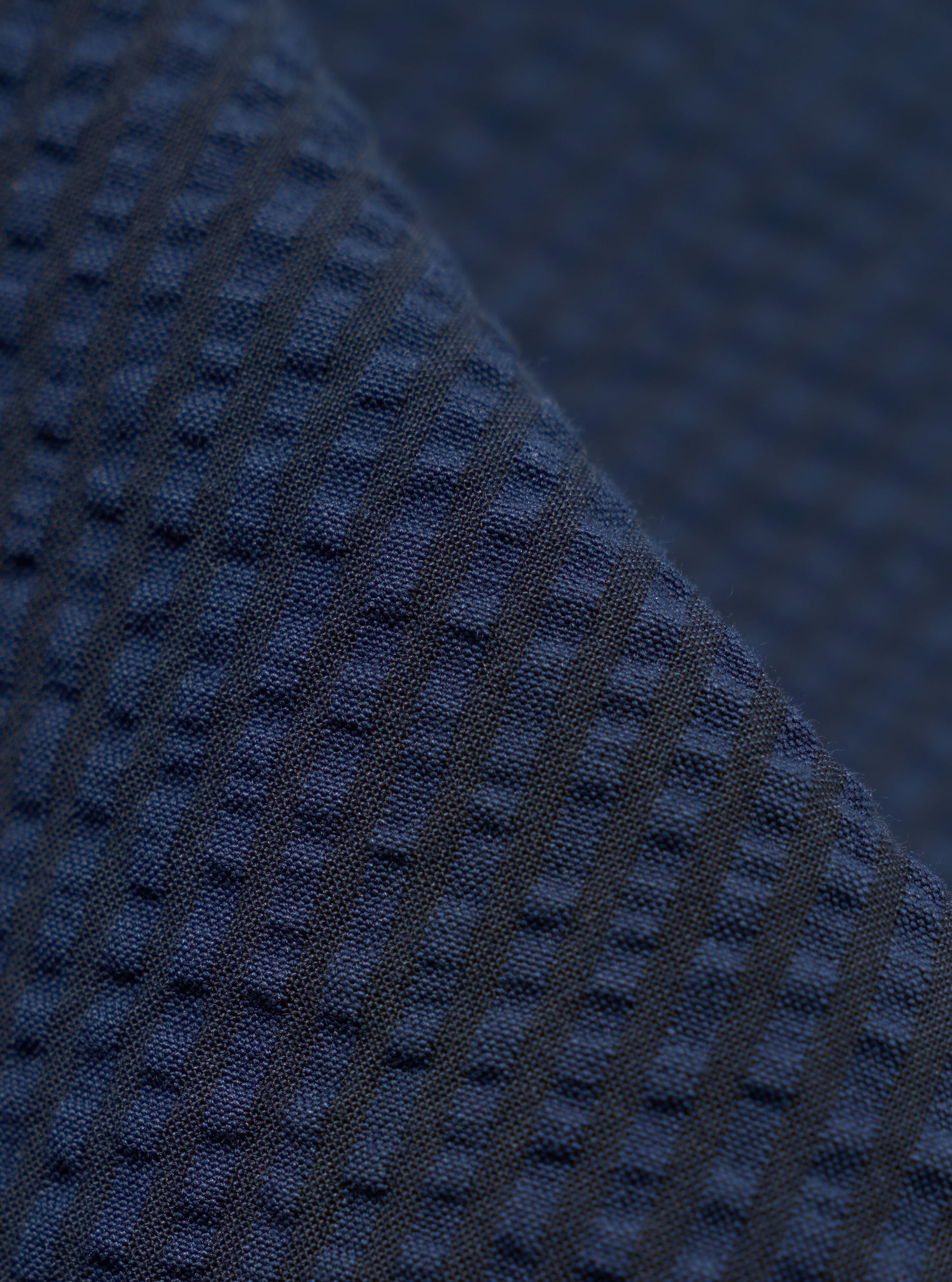 A close-up swatch image of the Navy Derby Stripe Duke Pant fabric displays a deep navy blue color with a distinct vertical derby stripe pattern. The texture of the cotton material is clearly visible, highlighting the weave of the fabric.