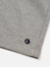 The Grey Marl Recycled Cotton Blend Jersey Vacation Short is shown from the back as a flat lay against a plain white background. The shorts feature an elasticated waistband and a single patch pocket on the right rear side. The fabric has a soft, heathered grey marl jersey texture.