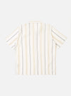 The Ecru/Navy/Sand Hendrix Stripe Road Shirt is displayed from the back as a flat lay against a plain white background. The shirt features a vertical stripe pattern in ecru, navy, and sand tones. The image highlights the clean construction of the back yoke and the straight hem.