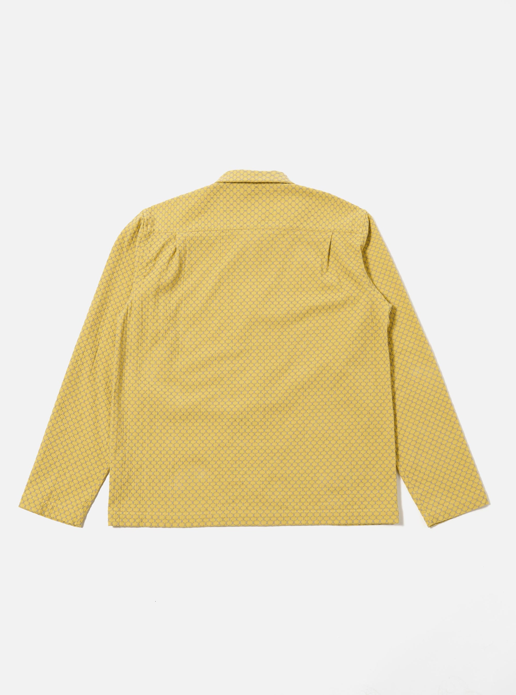 The Yellow Mykonos Cotton Zip Shirt is shown from the back as a flat lay against a plain white background. The image highlights the clean, simple construction of the shirt's rear panel and the bright yellow textured cotton fabric.