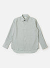 The Green Seersucker Square Pocket Shirt is shown as a flat lay against a white background. The shirt features a button-down front, a classic collar, and two prominent square patch pockets at the chest. The fabric has a distinct puckered seersucker texture in a solid green color.