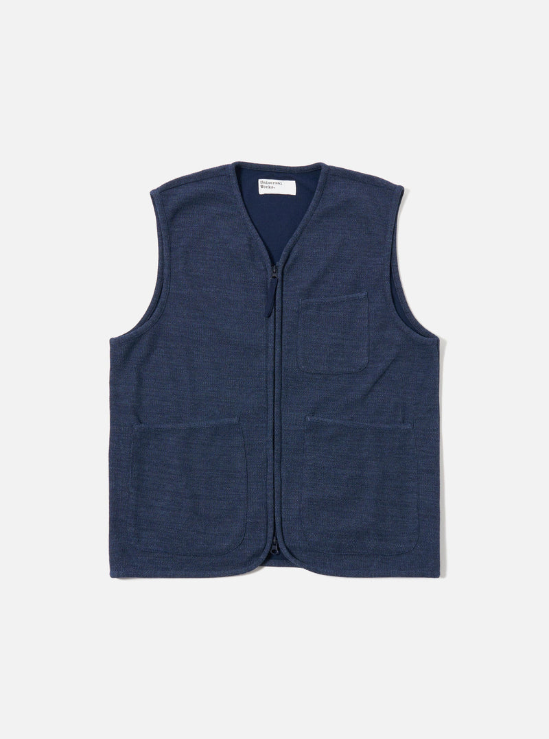 The Navy Maiorca Jersey Zip Gilet is presented as a flat lay against a plain white background. The gilet features a central zip-front closure and two large patch pockets at the waist. The navy blue garment is made from a textured jersey fabric and finished with a simple, clean neckline.