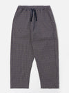 The Navy Konos Cotton Judo Pant is shown as a flat lay against a white background. The trousers feature a relaxed, straight-leg fit, an elasticated waistband with an external drawcord, and two front slanted pockets. The dark navy cotton fabric has a subtle, textured pattern throughout.