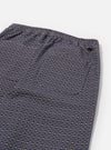 The Navy Konos Cotton Judo Pant is shown as a flat lay from the back against a plain white background. The image highlights the two rear patch pockets and the elasticated waistband of the trousers. The navy blue fabric features an all-over intricate pattern.