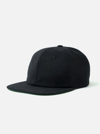 The Black Canvas Baseball Hat is shown as a flat lay against a plain white background. The hat features a structured six-panel crown, a curved brim, and a matching fabric button at the top. The black cotton canvas fabric has a visible durable texture.