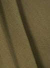 A fabric swatch showing a close-up texture view of the Walsh x Universal Works Light Olive Twill Troopers Jacket on a clean white background. The shot highlights the fine weave and light olive green cotton twill fabric.
