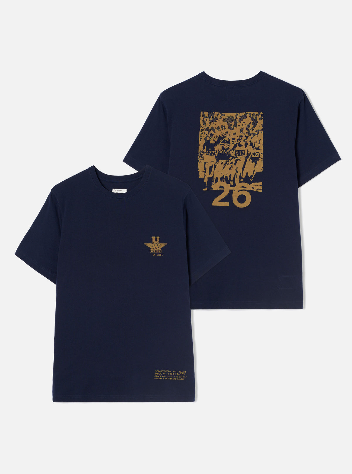 An angled detail shot of the Walsh x Universal Works Navy Single Jersey T Shirt set against a plain background. The view highlights the chest print graphic, smooth jersey texture, precise collar stitching, and rich navy blue tone.