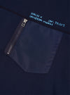 Detailed front shot of the Walsh x Universal Works Navy Brushback Sweat Panelled Loose Sweatshirt against a off-white background. The image highlights the neck ribbing, precise stitching across chest panels, and navy fabric texture.