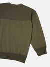 Back view of the Walsh x Universal Works Olive Brushback Sweat Panelled Loose Sweatshirt set against a clean studio backdrop. The layout highlights the olive green hue, dropped shoulders, panelled stitching, and ribbed bottom hem.