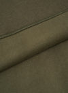 Macro fabric swatch image of the Walsh x Universal Works Olive Brushback Sweat Panelled Loose Sweatshirt. The close-up emphasizes the olive green knit texture, soft brushed cotton surface, and premium material quality.
