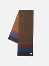 Front product view of the Brown Reversible Wool Himalayan Scarf arranged neatly on a light neutral background. The photograph showcases the scarf's subtle pattern, soft fringed trim, and versatile reversible construction.