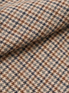 Extreme close-up swatch image of the Taupe Lester Dogtooth Franck Jacket fabric on a plain background. The shot emphasizes the intricate taupe and cream houndstooth weave and detailed textile surface texture.
