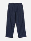 Navy check wool mix chinos laid flat on a light grey backdrop. The fabric features a fine grid check pattern in grey on navy. A single bronze button fastens the waistband, with a zip fly, front pleats, slanted side pockets, and turned-up cuffs at the full-length hem.