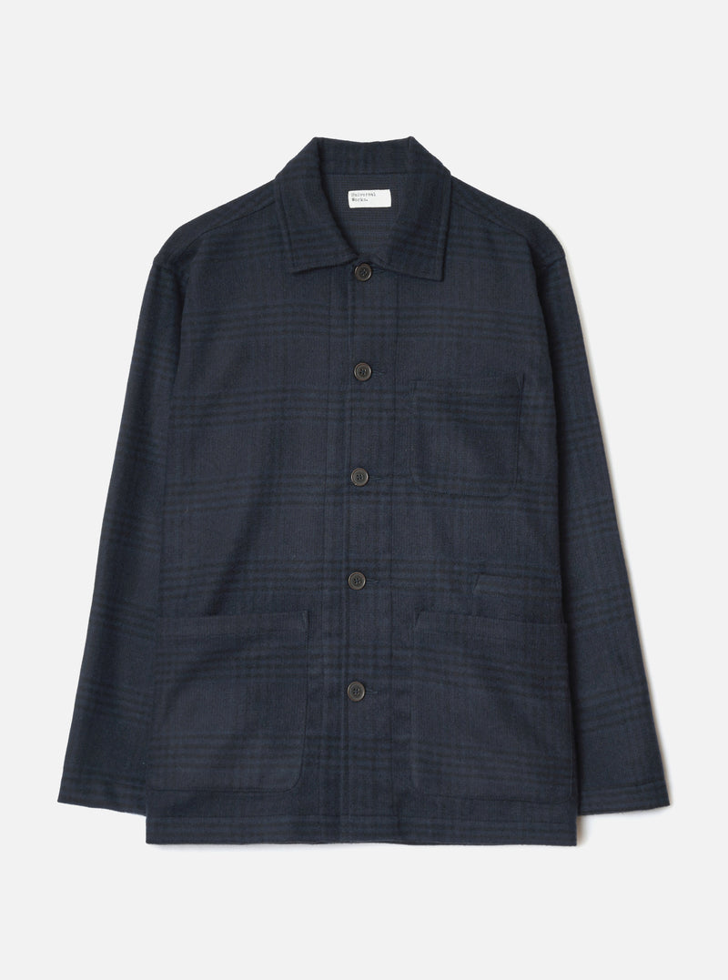 The Navy Bob Wool Mix Bakers Overshirt is laid flat on a white studio backdrop. It showcases a tonal check pattern, spread collar, five dark horn-effect buttons, one chest patch pocket, two large lower pockets, and long sleeves with plain cuffs.