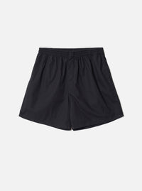 Front view of the Universal Works Black Broadcloth Boxer Shorts presented on a neutral background. Features plain black cotton broadcloth fabric, comfortable elasticated waistband, and classic casual cut.