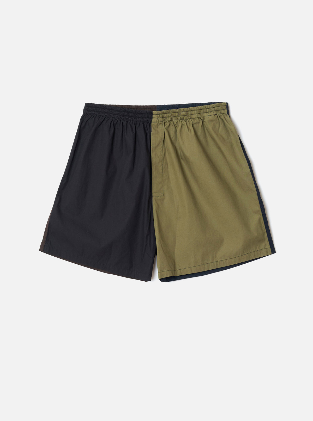 Front view of the Universal Works Mix Broadcloth Boxer Shorts displayed against a neutral background. Showcases a colorful patchwork design in cotton broadcloth fabric with an elasticated waist.