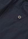 Back view of the Universal Works Navy Broadcloth Boxer Shorts displayed against a neutral background. Showcases the smooth navy blue cotton broadcloth material, flexible elastic waist, and clean stitch detail.