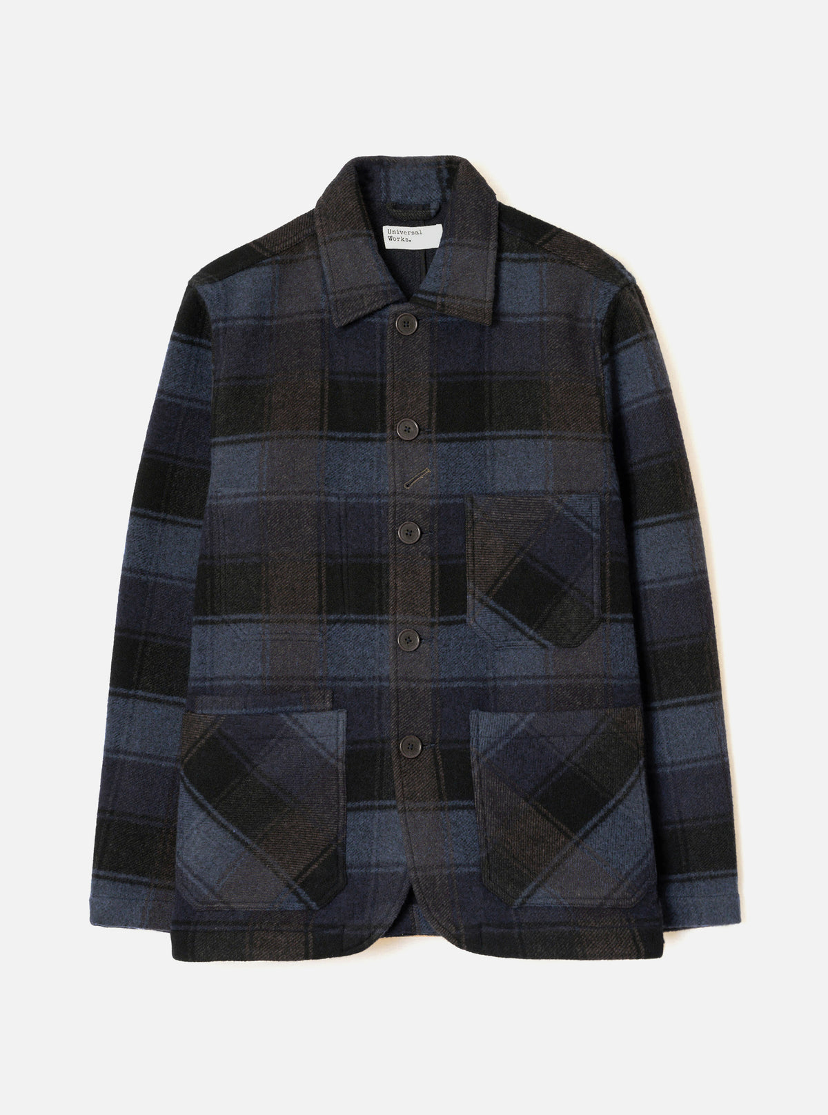 Front view of the Universal Works Navy/Brown Berlin Wool Check OG Bakers Chore Jacket against a plain backdrop. The jacket features a navy and brown check pattern, front button closure, and angled patch pockets.