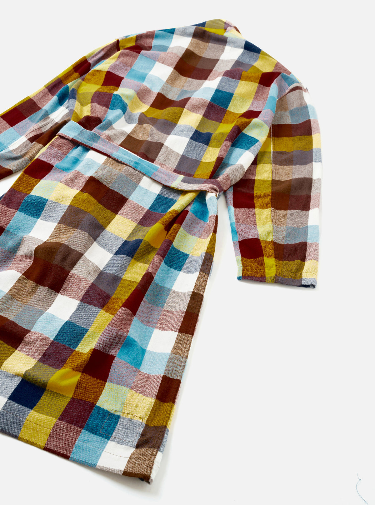 A studio rear view of the Multi Check Evans Check Short Dressing Gown against a neutral background. The image displays the back panel of the cotton robe, highlighting the waist belt loops and vibrant multi-colored check pattern.