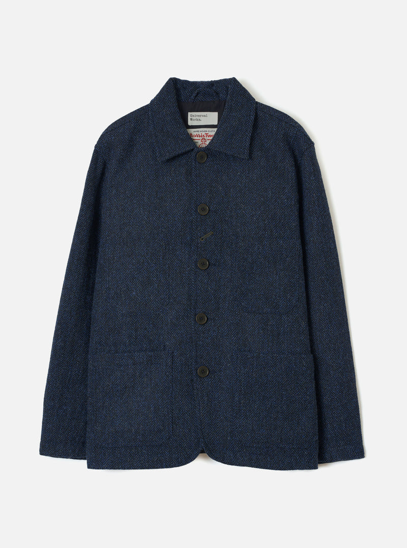 Front product view of the Blue/Black Harris Tweed OG Bakers Chore Jacket laid flat against a plain background. The blue and black wool jacket features front button closures, a collar, and multiple patch pockets.