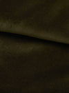 Close-up of olive green velvet fabric, folded to show its dense, soft pile and smooth surface. The deep khaki-olive tone has a subtle lustre, with a diagonal fold creating a sharp ridge across the frame. No garment details are visible.
