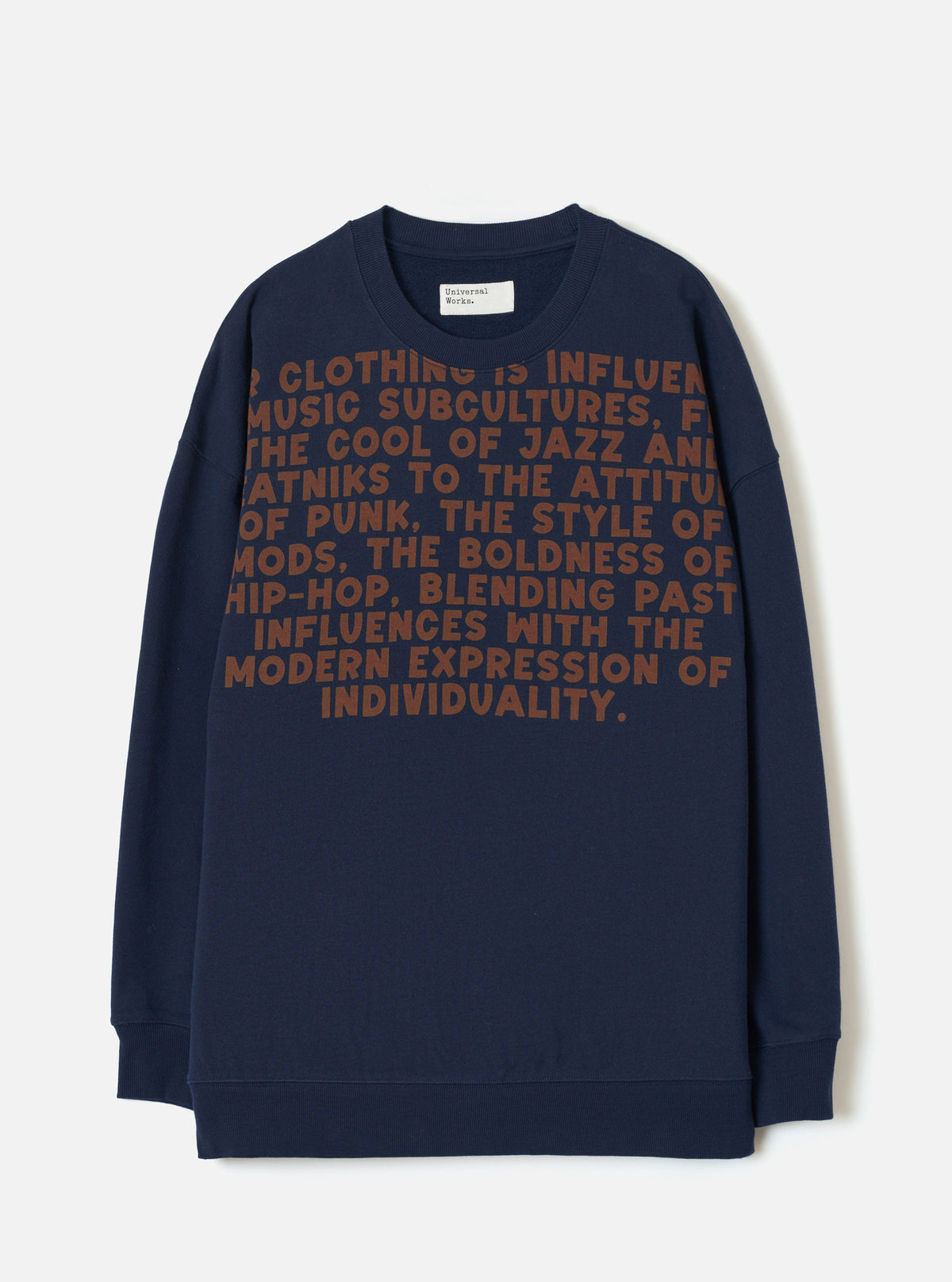 A product shot of the Universal Works Navy Brushback Sweat Cool Of Jazz Loose Sweatshirt displayed flat against a plain background. The navy cotton sweatshirt features a loose fit, ribbed crew collar, long sleeves, and front print.