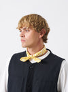 A group arrangement of cotton neckerchiefs featuring the Mustard Jazz/Beatniks Print Neckerchief set on a plain background, displaying the graphic jazz text print and vibrant hue.