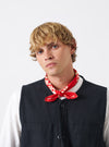 A group shot of printed neckerchiefs showcasing the Red Jazz/Beatniks Print Neckerchief on a clean backdrop, highlighting its eye-catching bold red color and graphic text print.