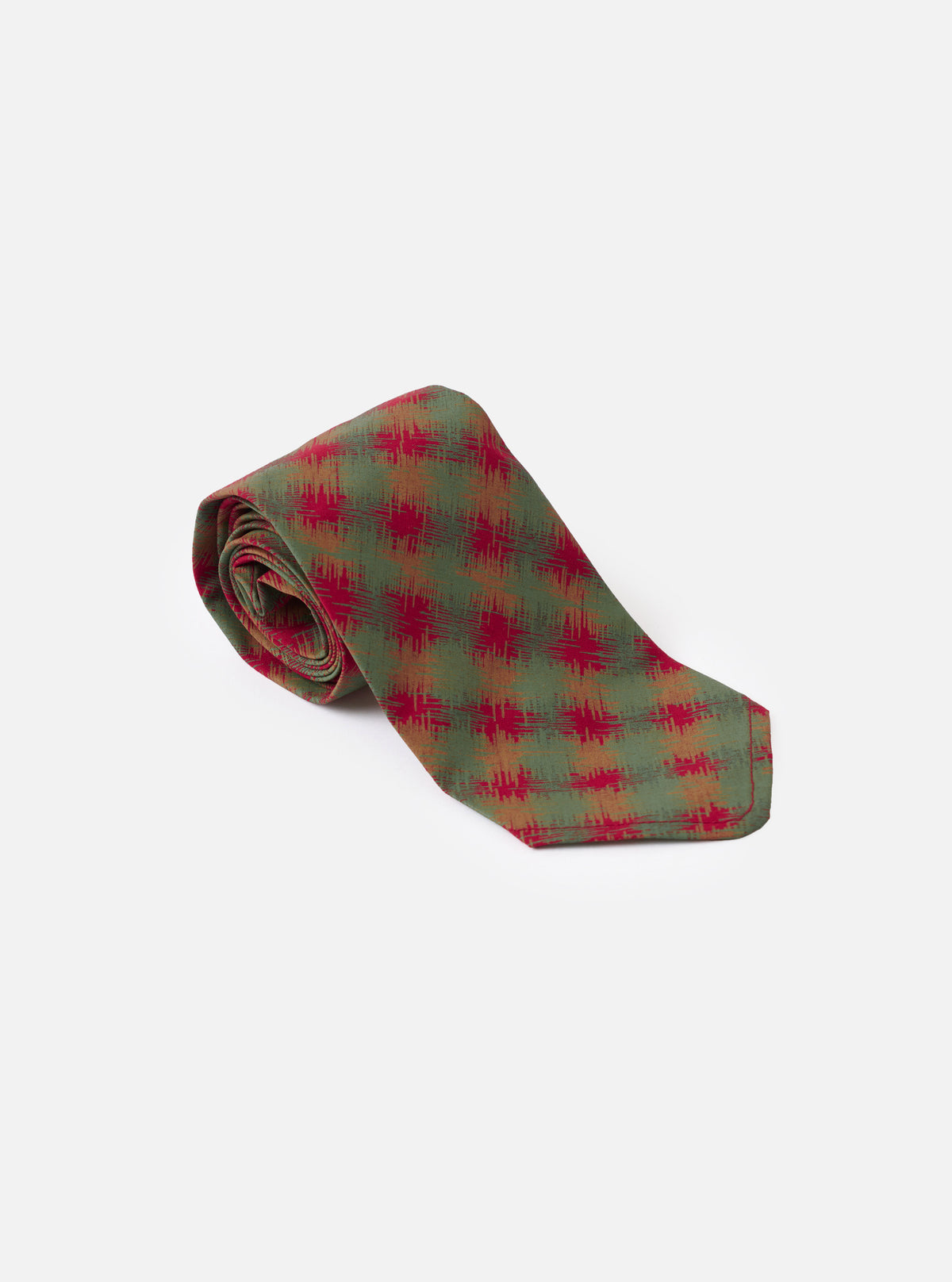 A detailed view of the Red/Green/Mustard Sound Wave Rayon Tie against a plain studio background, displaying the smooth woven texture and colorful geometric wave motif throughout.