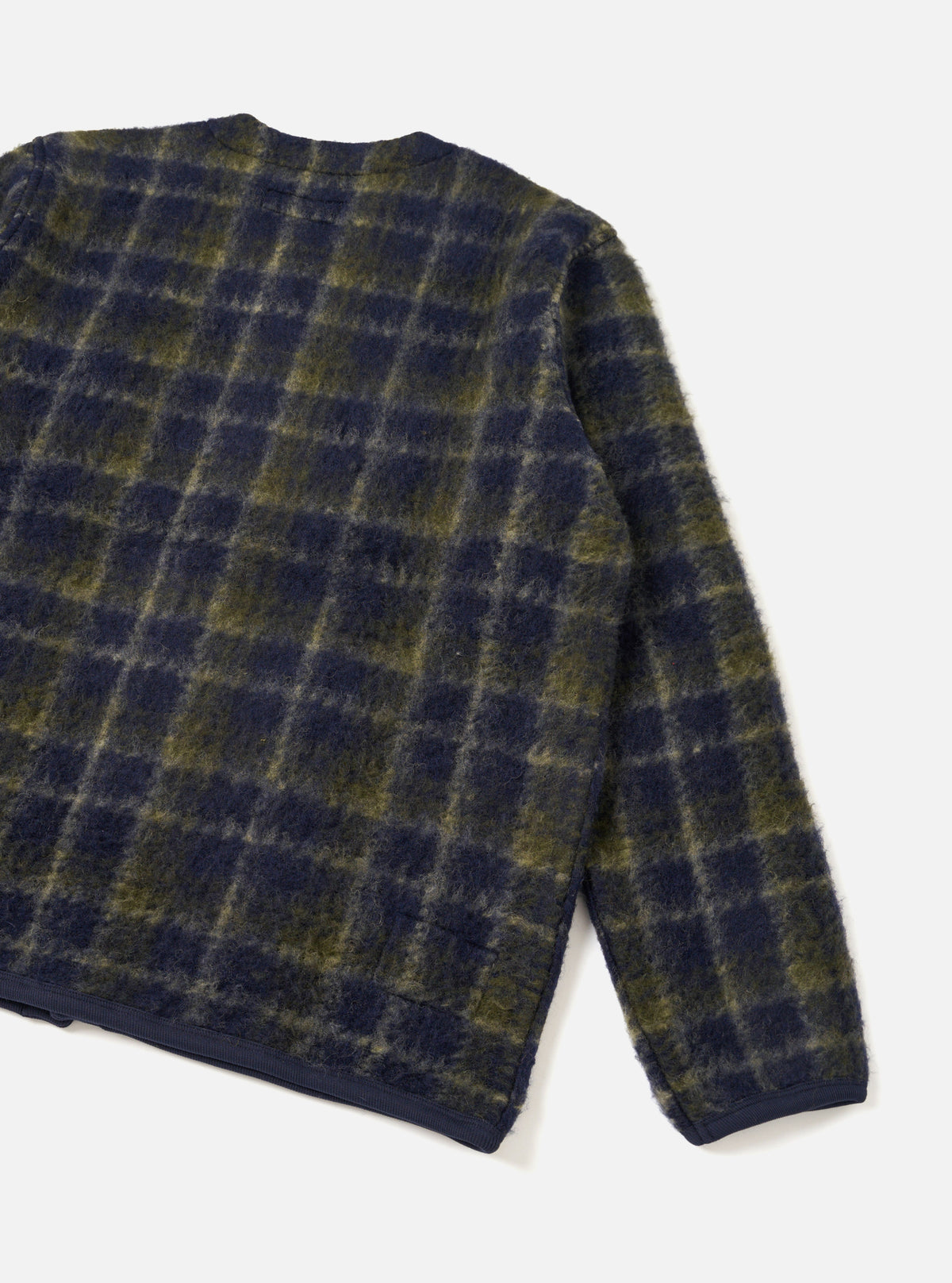 The Navy/Olive Check Daffy Fleece Mix Cardigan displayed flat against a plain studio background. The back view highlights the subtle check pattern, soft fleece fabric, and casual loose silhouette.