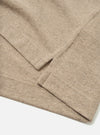 Close-up detail view of the Dark Sand Recycled Wool Mix SJ Pullover L/S Shirt on a light background, emphasizing the four-button placket, fashioned collar, chest pocket, and neat stitching details.